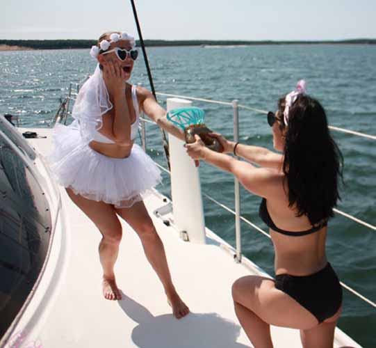 Best bachelorette party aboard valkyrie private yacht rental - Sunset Beach Southampton