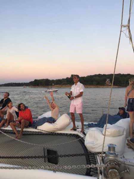 Photo of Valkyrie with guests enjoying the sun Sunset Beach Half Day Sail