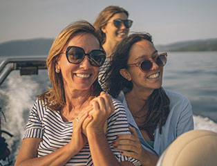 family enjoying septemeber boating in sag harbor