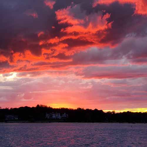 Guest enjoying Sag Harbor Sunset Sail aboard private boat rental Noyack Bay